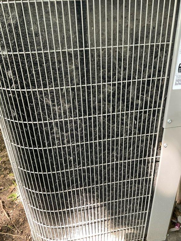 Completed scheduled cooling maintenance on a one-year-old air conditioning system. Upon arrival, performed comprehensive inspection of outdoor condenser unit, which revealed significant accumulation of dust, dirt, and debris trapped between condenser fins and coils. Cleaned condenser coils to restore proper airflow and heat transfer efficiency, removing particulate buildup that had collected during the unit's first year of operation. Inspected refrigerant lines, electrical connections, and all accessible components in the side yard installation area. System tested and confirmed operating within normal parameters following maintenance completion.