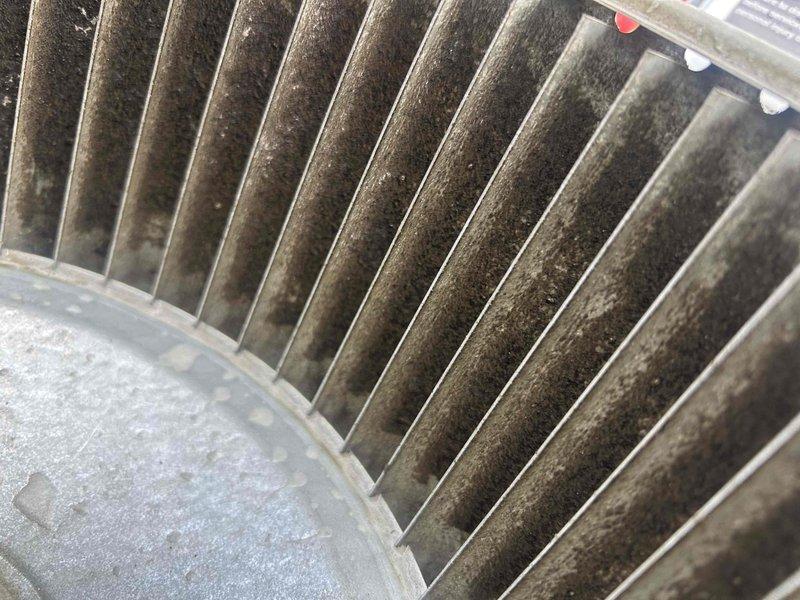Performed routine maintenance on a 7+ year old air conditioning system. Inspected condenser coil and evaporator coil, both showing heavy accumulation of dirt, dust, and debris restricting airflow. Documented coil condition with photos showing significant buildup on fin surfaces requiring cleaning to restore proper system efficiency and performance.