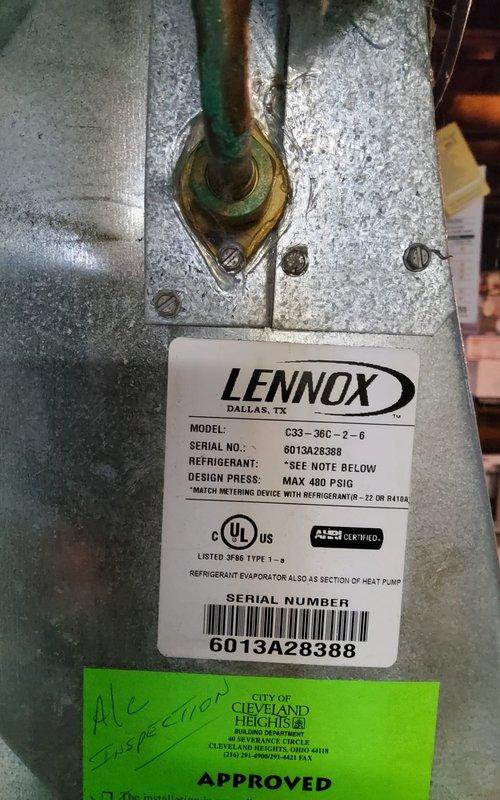 Completed routine cooling system maintenance on a 12-year-old Lennox residential air conditioning unit, model C33-36C-2-6. Performed comprehensive inspection of outdoor condenser unit, verified refrigerant lines and connections, documented equipment condition with photographs, and confirmed system operational status per manufacturer specifications.