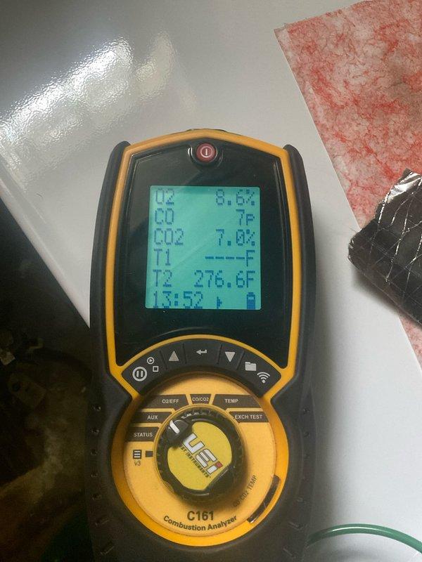Completed comprehensive tune-up service on both air conditioning and furnace systems for newly purchased home. Performed combustion analysis on heating equipment, recording flue temperature of 276.6°F and verifying proper O2, CO, and CO2 levels within manufacturer specifications. Inspected furnace heat exchanger through sight glass port, confirmed all safety controls operational, and discussed establishing annual preventive maintenance schedule with homeowner to ensure ongoing system reliability.