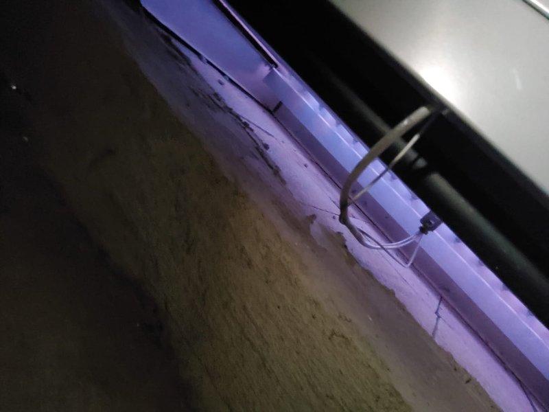Completed initial service call to assess steam boiler system experiencing moisture damage to surrounding structures and adjacent piping areas. Upon inspection, observed deteriorating ceiling conditions near steam radiator unit with visible water damage, peeling paint, and plaster degradation caused by escaping steam and condensation. Documented existing copper piping configuration, radiator connections, and areas of concern including compromised wall surfaces showing moisture streaking and staining. Discussed remediation options with customer to address steam containment issues and prevent further structural damage to basement utility area.