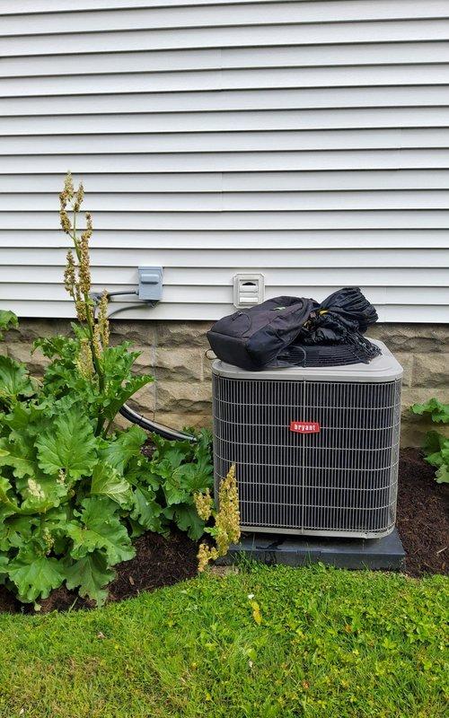 Performed comprehensive air conditioning tune-up and preventative maintenance on a four-year-old Bryant cooling system. Conducted complete system inspection including condenser unit evaluation, refrigerant level check, electrical connection testing, and airflow verification. Cleaned condenser coils, inspected fan motor operation, tested capacitor functionality, and verified proper drainage from condensate system. All components operating within manufacturer specifications with no deficiencies noted. System ready for cooling season operation.