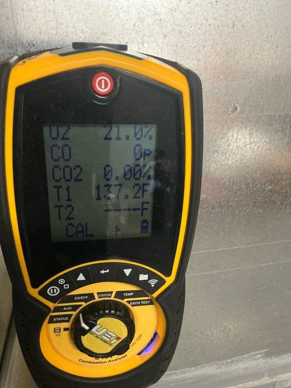 Performed comprehensive tune-up on 5-year-old furnace system currently operating normally. Conducted combustion analysis testing using digital analyzer, measuring oxygen levels (21.0% ambient, 0.2% in flue), carbon monoxide (0 ppm ambient, 8 ppm in flue), carbon dioxide (7.2%), and temperature readings (137.2°F and 105.1°F at different test points). All combustion readings within acceptable parameters for safe and efficient operation. System confirmed to be functioning properly with no issues identified.
