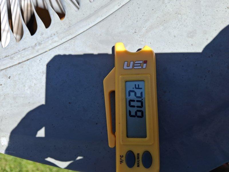 Completed scheduled cooling system maintenance on 5-6 year old air conditioning unit. Performed standard tune-up procedures including system inspection, temperature readings, and equipment assessment. Supply air temperature measured at 60.3°F, indicating proper cooling performance. All components operating within normal parameters at time of service.