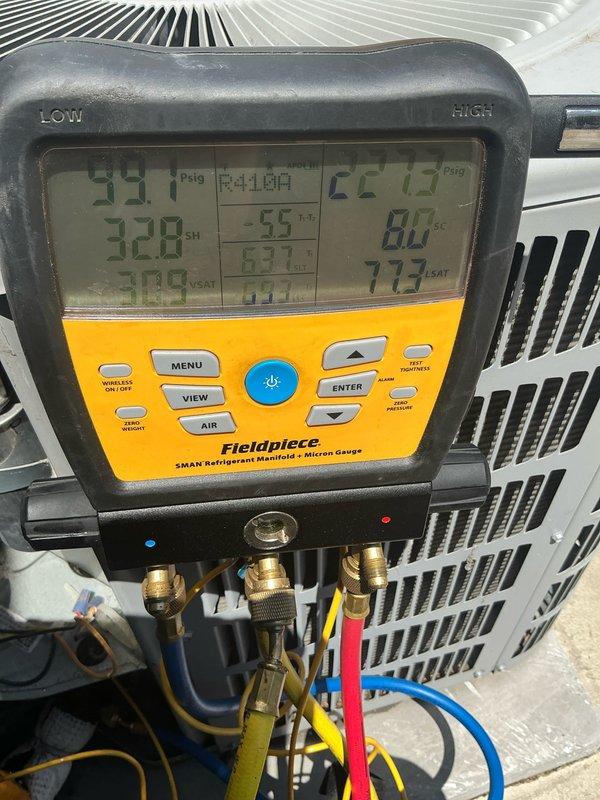Completed comprehensive cooling tune-up maintenance on three HVAC systems including one air handler and two traditional air conditioning units as part of scheduled recurring service. Performed refrigerant pressure and temperature diagnostics using manifold gauges, with all systems showing proper operating parameters. Identified and documented significant dust and debris accumulation on blower wheel assembly, indicating extended operation period requiring attention to maintain optimal airflow efficiency.