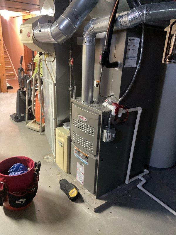 # HVAC Tune-Up Completed

Performed comprehensive seasonal tune-up on 3-year-old Lennox air conditioning system. Inspected indoor furnace unit in basement and outdoor condenser unit, verified proper operation of all components, checked refrigerant levels, cleaned condenser coils, and tested system performance. All equipment found to be operating within manufacturer specifications with no issues identified.