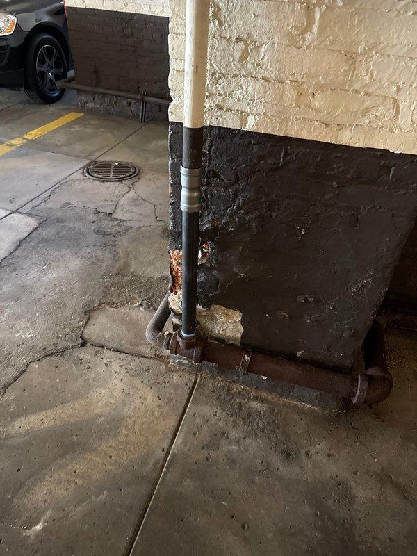 Responded to service call for pinhole leak in return line. Located damaged section of piping in parking garage area and successfully replaced the compromised segment with new materials. Verified system integrity upon completion and confirmed no additional leaks were present.
