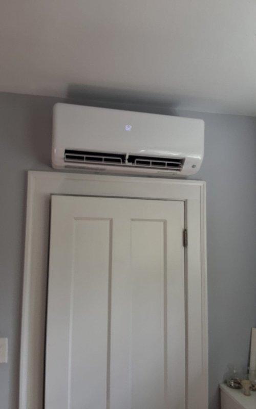 Performed startup and commissioning procedures on newly installed ductless mini-split system. Verified proper operation of wall-mounted air handler unit and floor-standing indoor unit, confirmed both units powered on successfully with indicator lights functioning. Tested system controls, airflow patterns, and overall performance to ensure installation met manufacturer specifications and operational standards.
