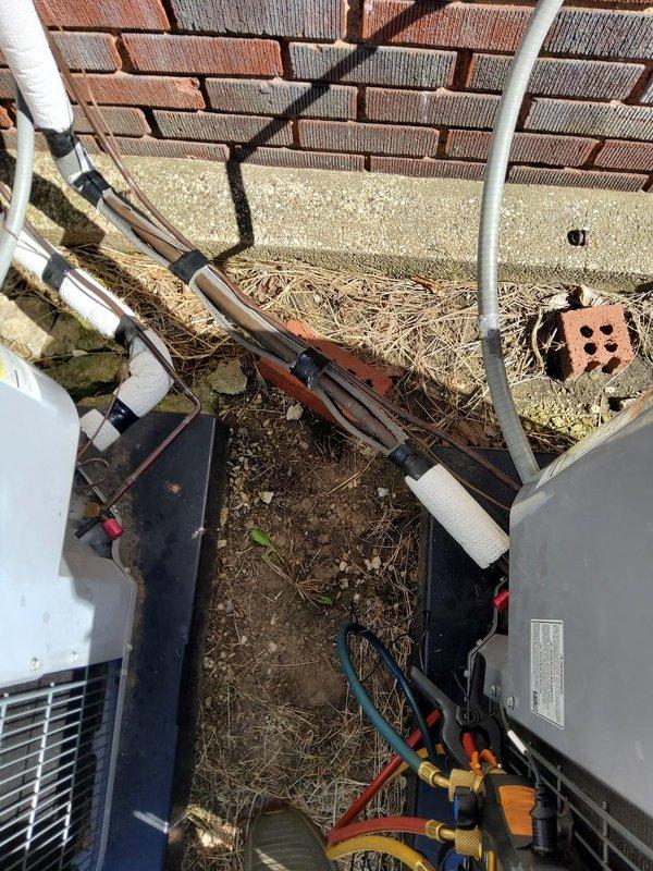 Completed comprehensive MVP AC tune-up on two 6-year-old outdoor cooling systems. Performed standard maintenance procedures including refrigerant pressure and temperature diagnostics using digital manifold gauges, verified system performance parameters, and inspected copper refrigerant lines, electrical connections, and condensing unit components. Both units operational and functioning within normal specifications upon completion of service.