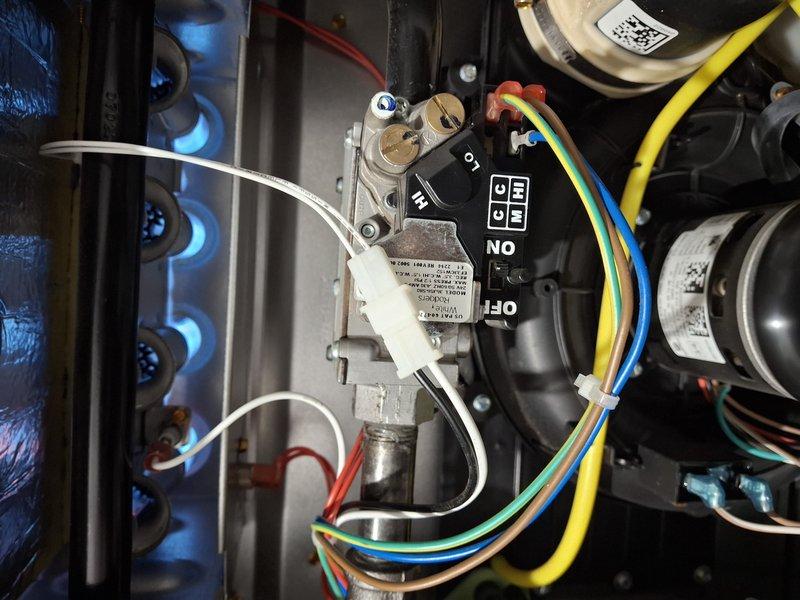 Completed maintenance on two furnaces including comprehensive tune-up procedures. Repaired 2" PVC combustion air piping where hole was improperly drilled, ensuring proper seal and venting integrity. Addressed interior rust spot by sanding and treating affected area to prevent further corrosion and maintain unit longevity.