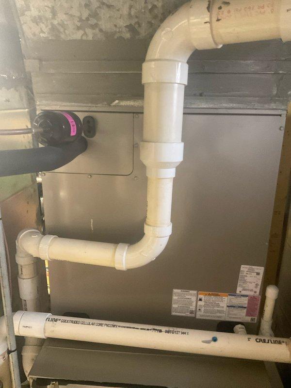 Completed comprehensive air conditioning tune-up on two-year-old dual HVAC system. Performed standard maintenance procedures including refrigerant pressure and temperature measurements using digital manifold gauge, verified proper subcooling and superheat levels, inspected condensate drainage system and PVC piping configuration, and evaluated overall system operation. Both air conditioning units tested within normal operating parameters and confirmed to be functioning properly with no deficiencies noted.