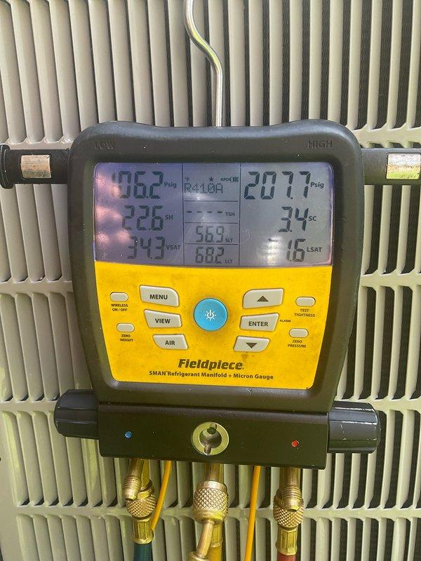 Completed comprehensive air conditioning tune-up on two-year-old dual HVAC system. Performed standard maintenance procedures including refrigerant pressure and temperature measurements using digital manifold gauge, verified proper subcooling and superheat levels, inspected condensate drainage system and PVC piping configuration, and evaluated overall system operation. Both air conditioning units tested within normal operating parameters and confirmed to be functioning properly with no deficiencies noted.