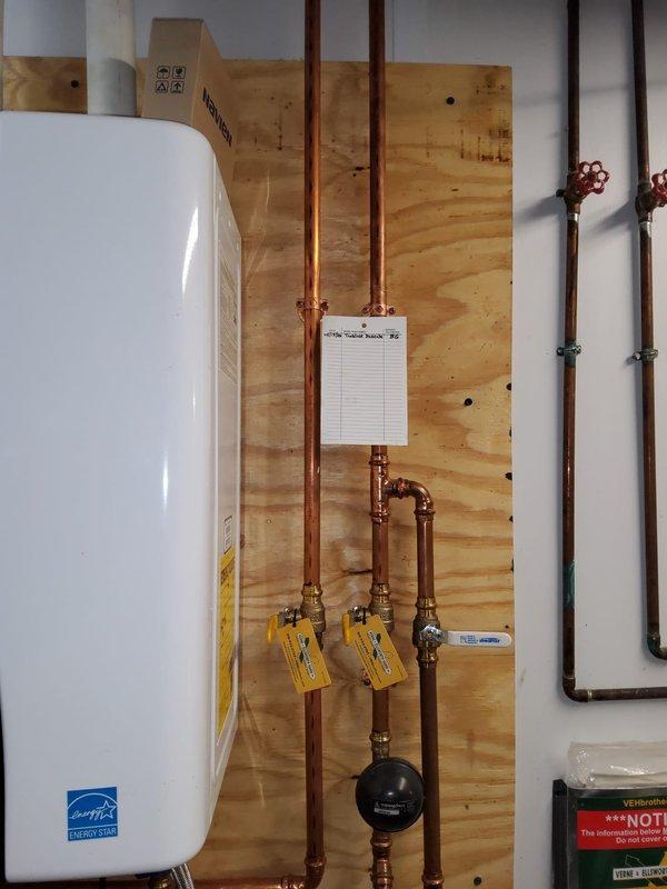 Performed complimentary tankless water heater maintenance flush on Energy Star-rated unit. Utilized circulation pump and bucket system to flush heating elements and heat exchanger, removing mineral buildup and sediment accumulation. Verified proper operation of isolation ball valves on inlet and outlet copper lines, confirmed system pressures, and tested unit functionality post-flush. Addressed discrepancy regarding service plan coverage documentation between client records and company system.