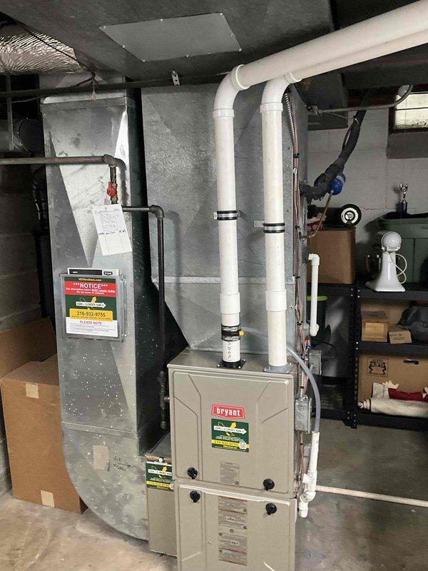 Conducted comprehensive assessment of residential HVAC system for air conditioning replacement estimate following ice damage to existing equipment. Documented current system configuration including Bryant furnace installation with PVC venting, associated ductwork, and air handler components. Evaluated mechanical room layout and existing infrastructure to determine replacement requirements and compatibility with new AC unit installation.