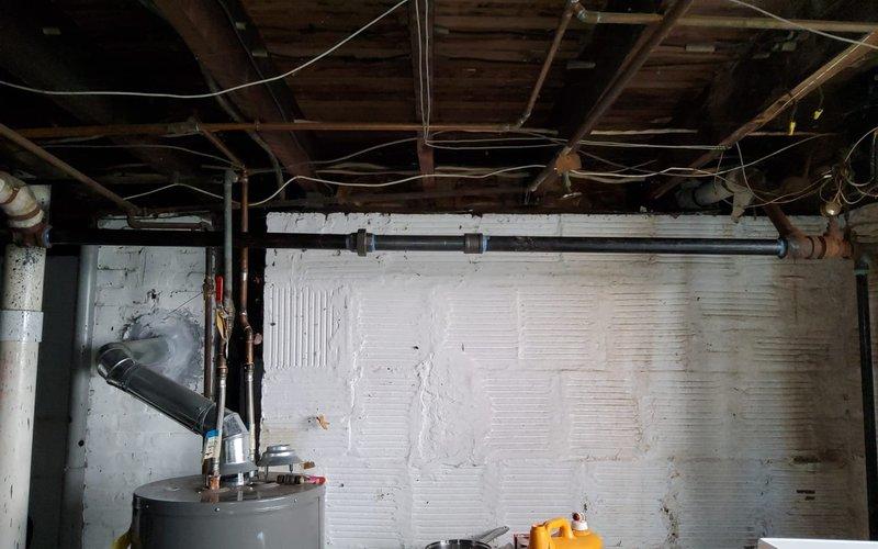 Responded to a no heat call and discovered severely corroded metal piping in the mechanical system. Repaired the affected section of piping to restore proper system operation and prevent potential failure. Customer will be remitting payment by mail.