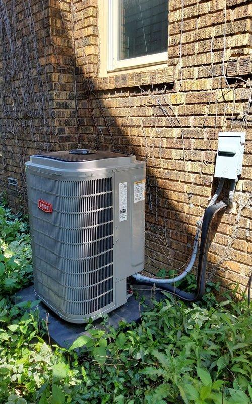 Responded to no-cool call on 2-year-old Bryant air conditioning system. Upon arrival, performed diagnostic inspection of outdoor condensing unit and verified unit was not powering on. Inspected electrical disconnect, conduit, and wiring connections at unit. Documented equipment nameplate data and current system condition with photographs for service records. System evaluated and findings provided to customer for repair authorization.