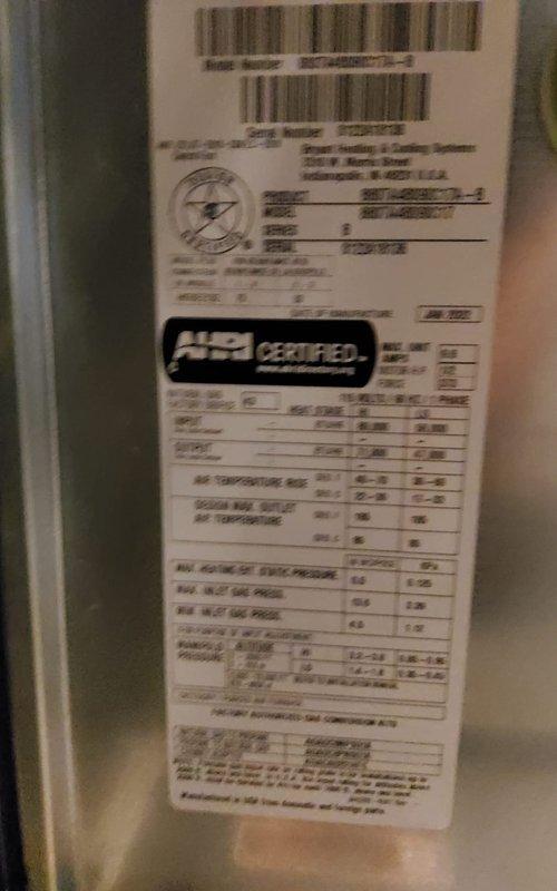 Responded to no-cool call on 2-year-old Bryant air conditioning system. Upon arrival, performed diagnostic inspection of outdoor condensing unit and verified unit was not powering on. Inspected electrical disconnect, conduit, and wiring connections at unit. Documented equipment nameplate data and current system condition with photographs for service records. System evaluated and findings provided to customer for repair authorization.