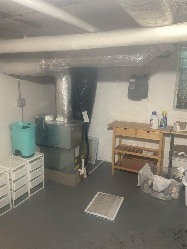 Completed comprehensive cooling tune-up on two HVAC systems as part of recurring home plan maintenance. Performed diagnostic testing on outdoor condenser unit using refrigerant manifold and micron gauge, recording temperature and pressure readings to verify proper system operation. Serviced indoor air handler unit in basement mechanical room and replaced air filter to ensure optimal airflow and system efficiency.