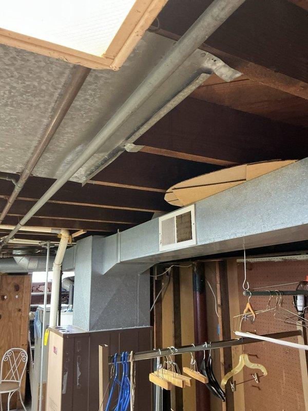 Conducted on-site assessment for heat pump and heat pump water heater replacement in residential property. Evaluated existing furnace and water heater system in basement mechanical room, documented current equipment configuration including ductwork connections and drainage systems, and provided estimate for upgrading to heat pump technology for both space heating and domestic water heating applications.