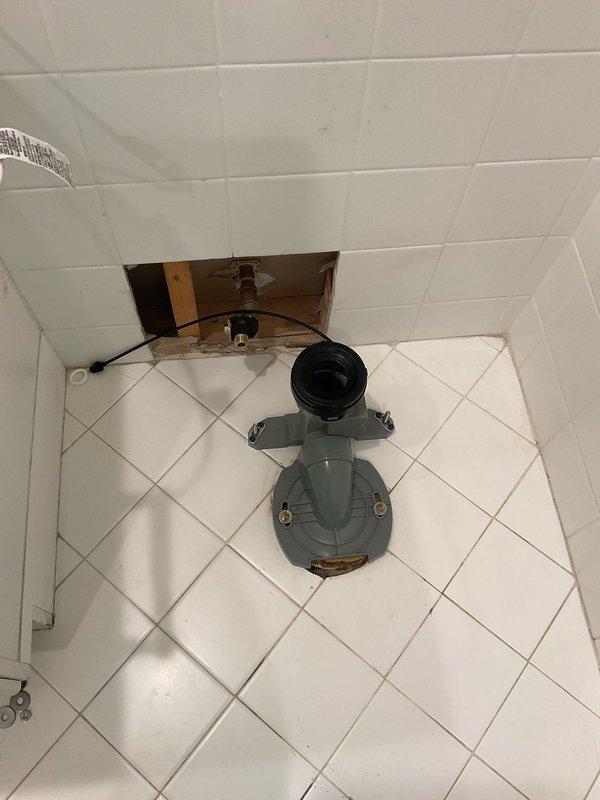 Completed installation of customer-supplied toilet in residential bathroom. Removed existing toilet fixture, prepared flange and wax ring seal, set new toilet unit, secured to floor, connected water supply line, and tested for proper operation and leaks. All plumbing connections verified and functional upon completion.