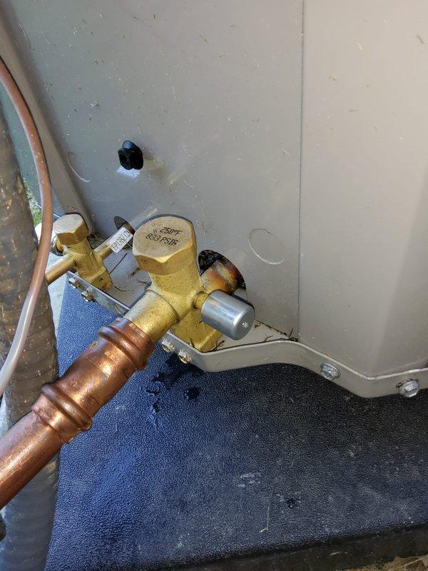 Completed A/C system startup and addressed exterior penetration sealing as identified during inspection. Properly caulked and sealed the wall penetration where refrigerant line set passes through vinyl siding to prevent air and moisture infiltration, ensuring code compliance and system protection.