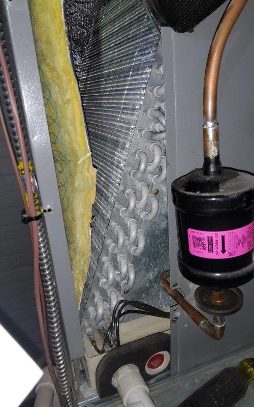 Responded to service call for 9-year-old central air conditioning system experiencing uneven cooling throughout the home with reduced efficiency. Upon inspection, discovered significant dust and debris accumulation on the evaporator coil fins, restricting airflow and reducing heat transfer capacity. Thoroughly cleaned evaporator coil using appropriate methods to restore optimal airflow and heat exchange performance. Inspected refrigerant lines, insulation, and condensate drainage system for proper operation. Verified all electrical connections and motor components were functioning correctly. System tested after service completion, confirming improved airflow distribution and cooling efficiency restored to normal operating parameters.