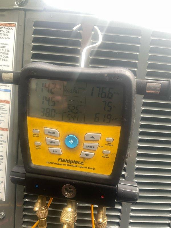 Performed comprehensive cooling system tune-up on Trane XR model 4TTR3030N1000BA outdoor condensing unit. Conducted standard maintenance procedures including system diagnostics, refrigerant pressure and temperature measurements using digital manifold gauges, and verification of electrical specifications against manufacturer nameplate ratings. Unit operational parameters confirmed within normal range, with system demonstrating proper cooling performance upon completion of preventive maintenance service.