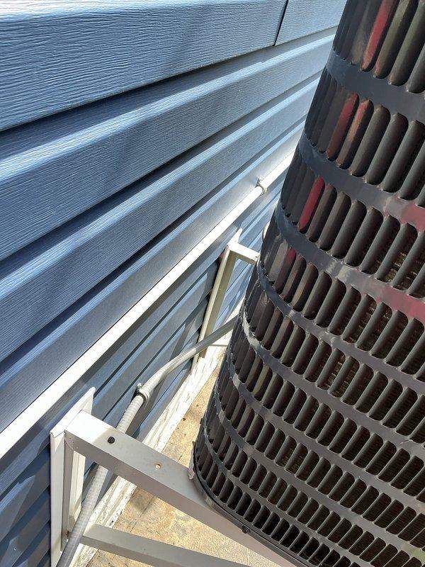 Responded to service call for air conditioning system not cooling effectively throughout residence. Evaluated existing 5-year-old system including basement-mounted furnace with refrigerant lines and outdoor cylindrical heat pump unit. Documented current equipment configuration and operational status. Provided comprehensive estimate for complete HVAC system replacement based on assessment findings and cooling performance issues.