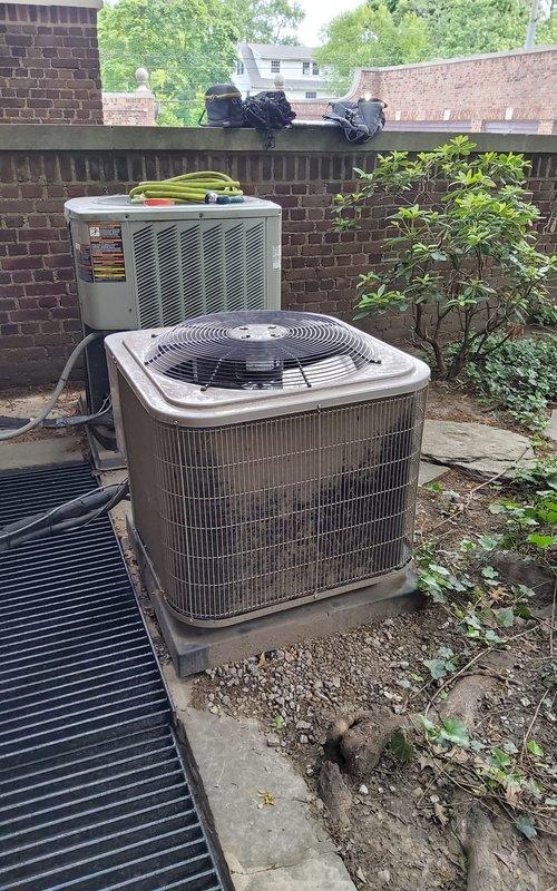 Performed routine maintenance on 3-year-old Unico system with outdoor condenser and second-floor indoor unit. Cleaned condenser coils by hosing out accumulated debris to restore proper airflow and heat transfer efficiency. Completed standard tune-up procedures including system inspection and operational verification.