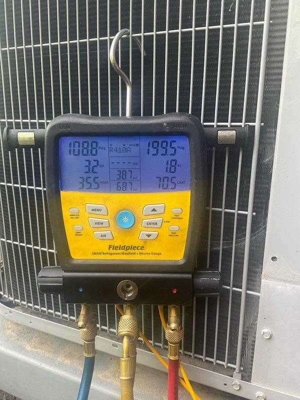 Completed cooling maintenance tune-up on residential air conditioning system with condenser unit located at ground level. Performed comprehensive system diagnostics using refrigerant manifold gauges, verified refrigerant pressures and temperatures, inspected condenser coil condition, and confirmed proper system operation on 9-year-old AC unit model 3G19E15241.