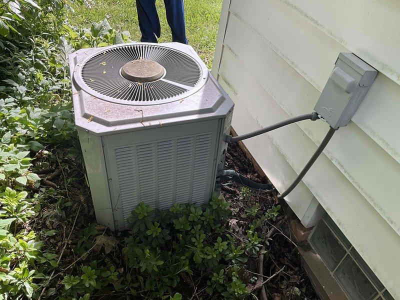 Conducted on-site evaluation for hyper heat ducted mini-split heat pump system installation. Customer specifically requested heat pump only configuration and declined dual fuel system option. Assessed existing HVAC infrastructure including aged outdoor condenser unit and basement mechanical room with water heater and brick chimney structure to determine optimal equipment placement and ductwork routing for new hyper heat system.