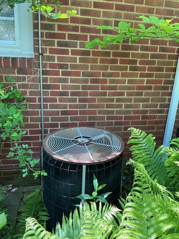 Responded to service call for 30+ year old air conditioning condenser unit that would not turn on. Performed diagnostic assessment of outdoor condenser unit and indoor furnace system, documented existing equipment condition showing significant age-related wear and corrosion on condenser top grille. Provided comprehensive estimate for complete HVAC system replacement due to equipment age exceeding serviceable lifespan and non-operational status of cooling system.