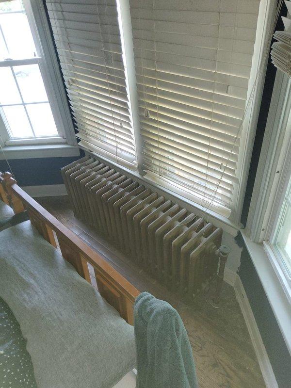 Responded to service call for radiator removal. Successfully disconnected and removed eight cast iron radiators from various locations throughout the residence, including units from bedroom and bathroom areas, to allow customer to have them professionally sandblasted for restoration. All radiator connections were properly capped and secured to maintain system integrity during the interim period. Documented existing radiator locations and configurations with photographs for accurate reinstallation reference. Provided quote for future reinstallation of all eight radiators upon completion of sandblasting work.