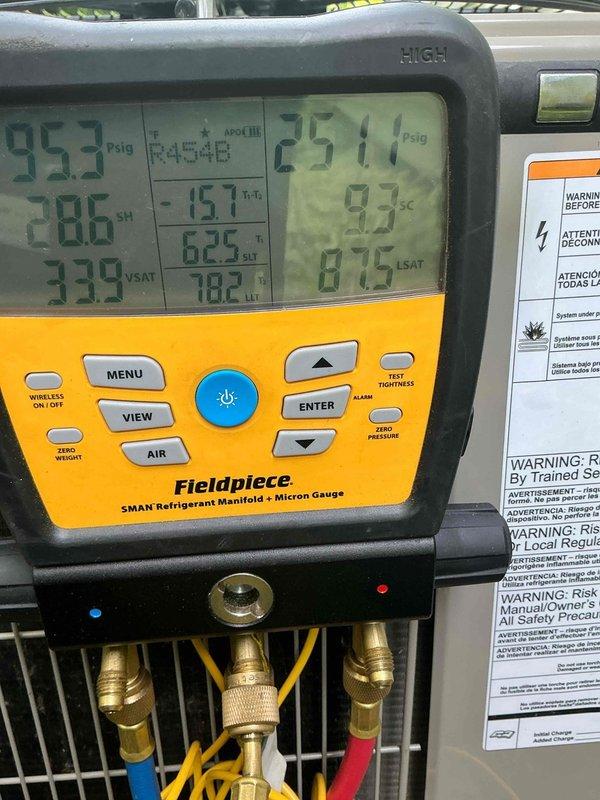 Responded to callback for recurring freeze-up issue on residential A/C system. Upon arrival, performed diagnostic testing using refrigerant manifold gauges, recording system pressures and temperatures including superheat and subcooling readings. Assessment revealed unit had been operated during ambient temperatures below manufacturer's recommended minimum operating conditions. Documented thermostat settings and system parameters with photos, explained improper operating conditions to customer, and advised against running system when outdoor temperatures are too low to prevent compressor damage and coil freezing.