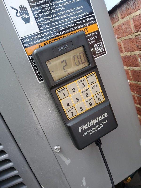 Completed routine maintenance and tune-up on 12-year-old Armstrong Air conditioning system. Performed comprehensive system inspection, measured refrigerant charge levels using calibrated digital scale, verified electrical connections and control board operation with all indicator LEDs functioning properly. No deficiencies noted; system operating within manufacturer specifications.