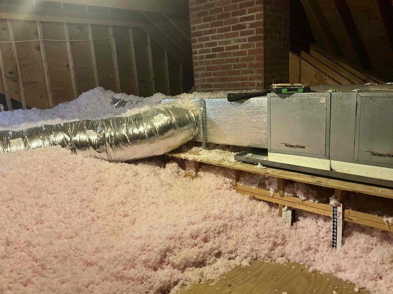Conducted on-site estimate for Unico system replacement with mini split evaluation. Inspected existing attic-mounted air handler unit and ductwork configuration, including flexible duct runs and insulation conditions throughout accessible attic spaces. Documented current HVAC infrastructure, equipment placement on platform above insulation, and spatial constraints around brick chimney penetration. Appointment rescheduled and customer confirmation left for follow-up coordination.
