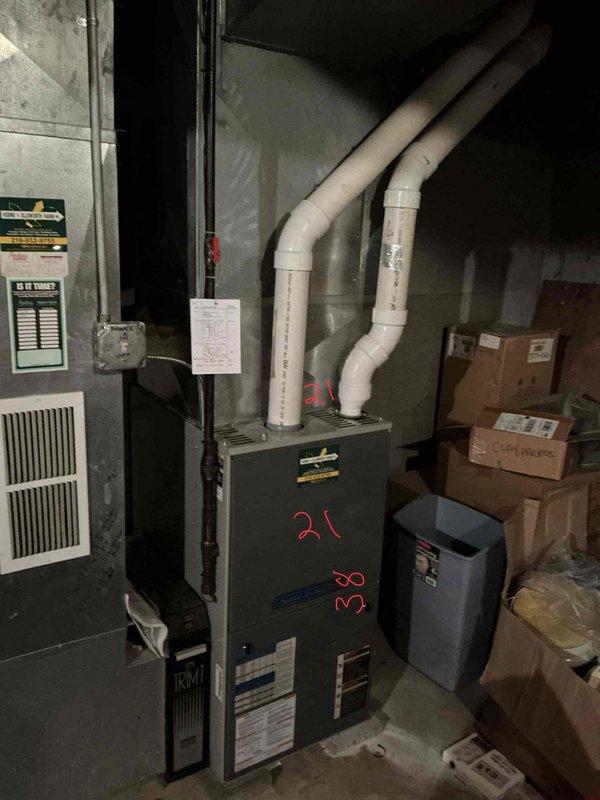 Responded to service call for non-operational air conditioning unit serving first floor master suite. Conducted thorough assessment of existing HVAC system located in basement mechanical room, including furnace and associated ductwork. Documented current equipment configuration, noting furnace unit with PVC exhaust/intake venting, condensate drainage system, and related mechanical components. Provided comprehensive estimate for complete system replacement to restore cooling capability to affected zone.