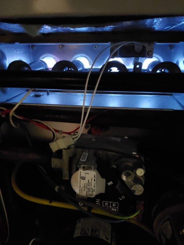 Responded to service call for routine maintenance on furnace and air conditioning system with reported water leak at furnace due to backup. Upon arrival, inspected 3-year-old gas furnace and found burner assembly operating with proper blue flame combustion. Examined blower motor, wiring connections, and lower compartment components for signs of water damage or obstruction. Investigated condensate drainage system to identify source of water backup causing leak. 

Proceeded to outdoor condensing unit to perform air conditioning system diagnostics. Utilized Testo 550 digital manifold gauge to measure refrigerant pressures and system temperatures. Recorded readings showing 48.2°F temperature with pressure measurements at 1028 and 2428 psi. Inspected condenser coils, which appeared clean and in good operational condition. Completed comprehensive system evaluation to ensure both heating and cooling systems were functioning properly and addressed water leak issue at furnace.