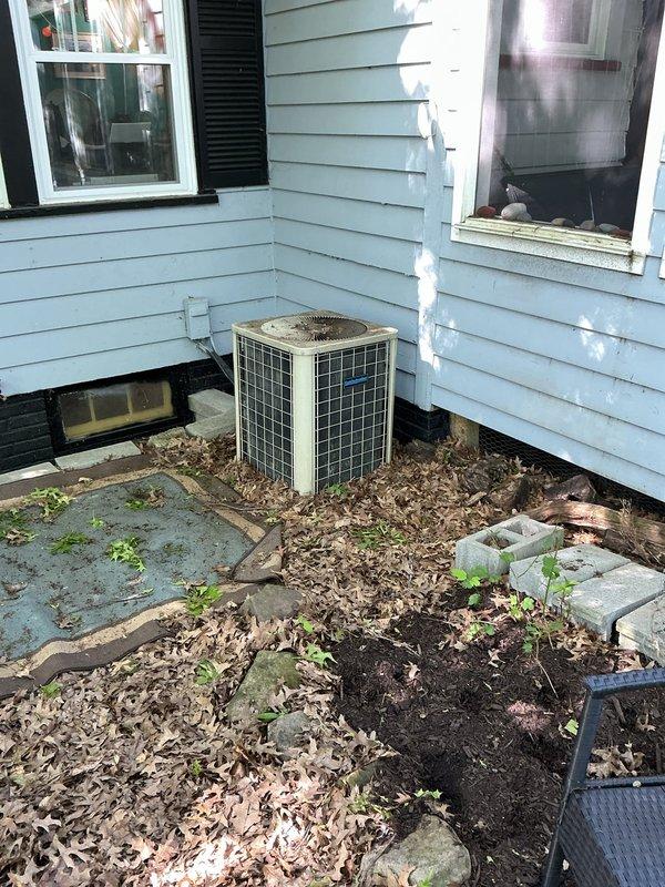 Responded to service call for non-cooling air conditioning system. Upon arrival, evaluated 20-year-old residential AC system including outdoor condenser unit and indoor components. Conducted thorough assessment of existing equipment condition and performance capabilities. Documented current system configuration with outdoor condenser unit located on exterior wall and indoor air handling equipment in basement utility area. Provided comprehensive estimate for complete HVAC system replacement due to age and inefficiency of existing equipment. Discussed replacement options and system specifications with homeowner.