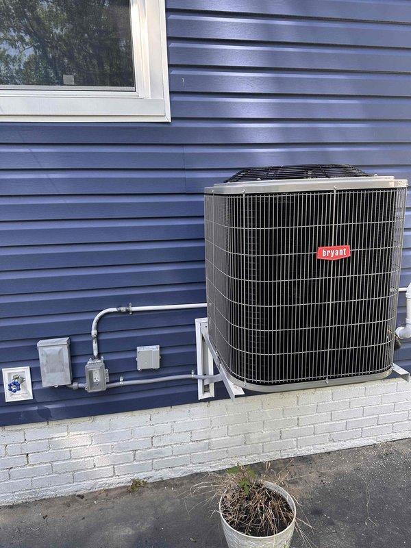 Completed full HVAC system replacement including new Bryant outdoor condensing unit, indoor furnace, and evaporator coil. The outdoor unit was professionally mounted on bracket system attached to foundation with proper electrical disconnect and conduit installation per code requirements. Inside the mechanical room, installed new furnace unit with all necessary ductwork connections integrated into existing distribution system. All equipment was tested for proper operation, refrigerant charge verified, and system commissioned to manufacturer specifications.