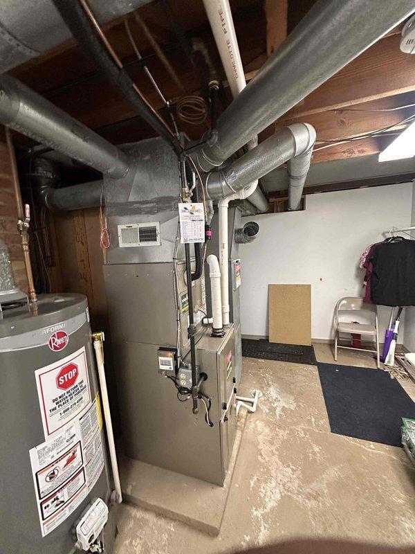 Completed full HVAC system replacement including new Bryant outdoor condensing unit, indoor furnace, and evaporator coil. The outdoor unit was professionally mounted on bracket system attached to foundation with proper electrical disconnect and conduit installation per code requirements. Inside the mechanical room, installed new furnace unit with all necessary ductwork connections integrated into existing distribution system. All equipment was tested for proper operation, refrigerant charge verified, and system commissioned to manufacturer specifications.