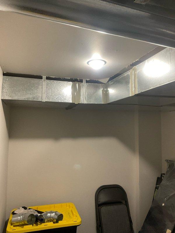 Performed comprehensive duct inspection and airflow assessment to address uneven air distribution throughout multi-story residence. Conducted camera inspection of ductwork system to identify damper positions and potential airflow restrictions in second and third floor supply runs. Inspected basement ductwork installation, evaluated main trunk line connections, and assessed branch duct routing to upper levels. Documented HVAC system configuration including flexible duct connections, refrigerant line placement, and insulation conditions in attic mechanical space. Identified accessible damper locations and provided recommendations for optimizing airflow balance to underperforming vents on upper floors.