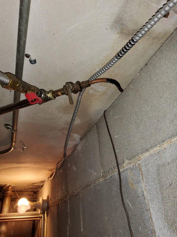 Responded to emergency gas leak call at 40-year-old residential property with gas supply shut off at meter. Located and assessed leak in basement gas line running from garage meter location. Due to age and condition of existing gas piping system, determined that line replacement was necessary rather than repair to ensure safe operation and code compliance.

Removed deteriorated gas line section in basement area where leak was detected. Installed new gas piping from meter location in garage through to basement termination point, utilizing proper copper and/or black iron pipe materials per local gas code requirements. Ensured all connections were properly fitted, secured, and supported according to manufacturer specifications and building codes.

Performed comprehensive pressure test on entire gas line system to verify integrity of new installation and absence of leaks. System held pressure within acceptable parameters throughout testing period. Conducted soap bubble test at all connecti