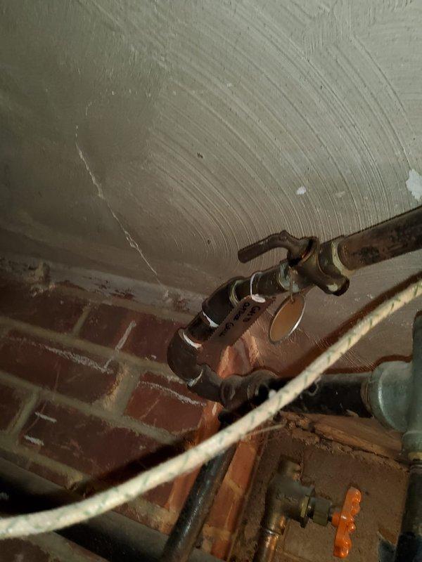 Responded to emergency gas leak call at 40-year-old residential property with gas supply shut off at meter. Located and assessed leak in basement gas line running from garage meter location. Due to age and condition of existing gas piping system, determined that line replacement was necessary rather than repair to ensure safe operation and code compliance.

Removed deteriorated gas line section in basement area where leak was detected. Installed new gas piping from meter location in garage through to basement termination point, utilizing proper copper and/or black iron pipe materials per local gas code requirements. Ensured all connections were properly fitted, secured, and supported according to manufacturer specifications and building codes.

Performed comprehensive pressure test on entire gas line system to verify integrity of new installation and absence of leaks. System held pressure within acceptable parameters throughout testing period. Conducted soap bubble test at all connecti