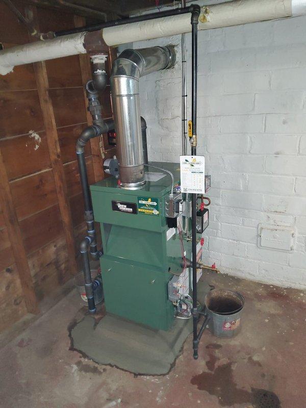 Successfully installed a New Yorker steam boiler model CGS50CNI-H with complete near boiler piping modifications. Installation included new automatic water feeder, low water cutoff, sight glass, pressure control, and backflow preventer, with existing thermostat reused for system control.