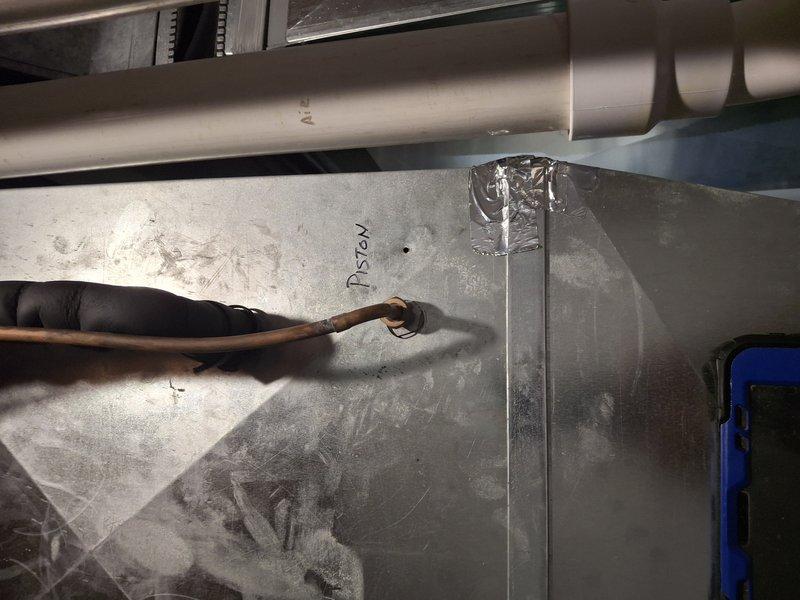 Performed comprehensive air conditioning tune-up on six-year-old system with no reported issues. Completed full maintenance inspection including evaporator coil examination, verified proper airflow across heat exchanger fins, and inspected refrigerant lines and connections. All components found in good working condition with no signs of corrosion or debris accumulation.