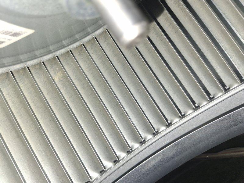 Performed comprehensive air conditioning tune-up on six-year-old system with no reported issues. Completed full maintenance inspection including evaporator coil examination, verified proper airflow across heat exchanger fins, and inspected refrigerant lines and connections. All components found in good working condition with no signs of corrosion or debris accumulation.