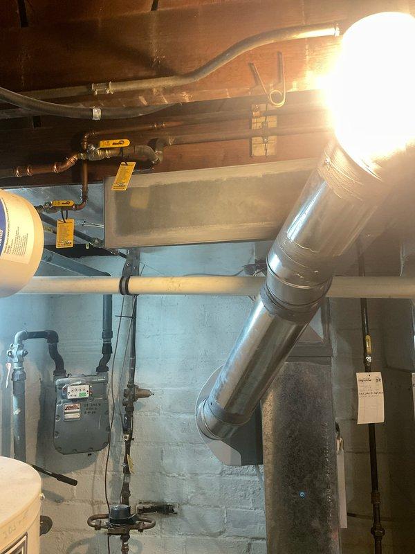 Completed installation of cold air return vent in basement utility area per customer request. New metallic ductwork was properly connected to existing HVAC system, with all joints secured and sealed to ensure optimal airflow and system efficiency.