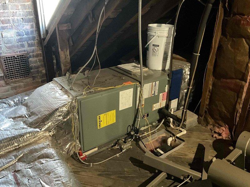Responded to no cooling complaint on 16-year-old air conditioning system. Performed comprehensive system evaluation of attic-mounted air handler unit and associated components. Documented existing equipment configuration including air handler, ductwork connections, refrigerant line routing, and electrical connections. Provided replacement estimate for complete HVAC system due to age and failure of existing equipment.