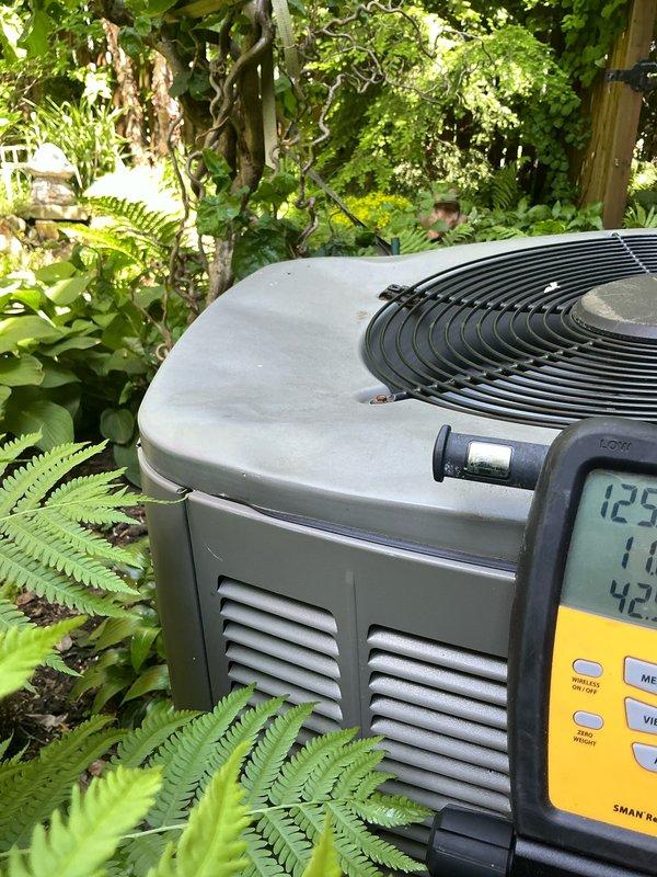 Completed annual cooling maintenance on residential air conditioning system. Performed comprehensive AC tune-up including inspection of outdoor condenser unit, verified proper operation of all components, and checked system pressures and temperatures using digital diagnostic equipment. Inspected blower wheel assembly and confirmed clean condition with no debris accumulation. System operating within normal parameters at time of service with no deficiencies noted.